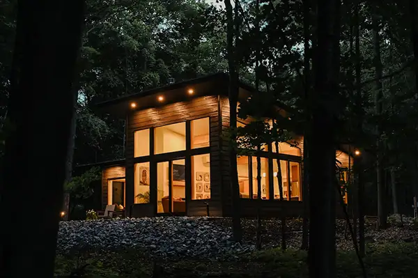 nice cabin in woods at night